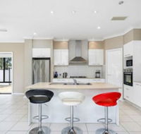 Central Gold Coast Large Modern Elevated Home - Yamba Accommodation