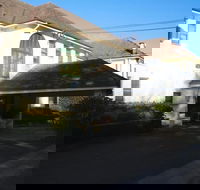 The Dormie House - On The Golf Course - Yamba Accommodation