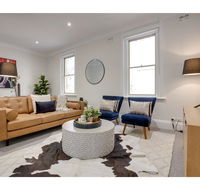 Large stylish and quiet penthouse steps from surf - Yamba Accommodation