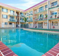 Bribie Beach King bed Unit overlooking pool - Yamba Accommodation