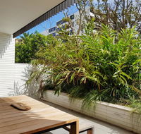 Executive Living in this Chic Garden Apartment - Yamba Accommodation