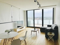 Modern Designer 2BR Apartment Near Airport  Beach