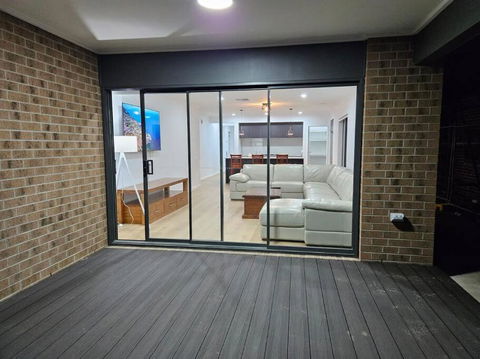 O Stylish 4 Room Oasis With 65 TV - Yamba Accommodation 3